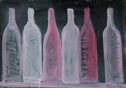 White and pink bottles on black background