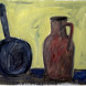 Pan and pitcher on a yellow background