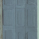 Grey door with panelling